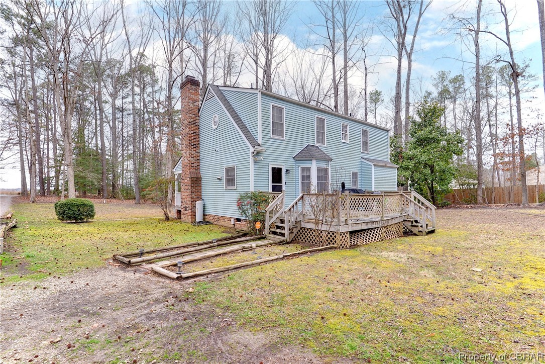 5301 North Courthouse Road Providence Forge, VA 23140 - Photo 22 of 26 a white house that has a tree in front of it