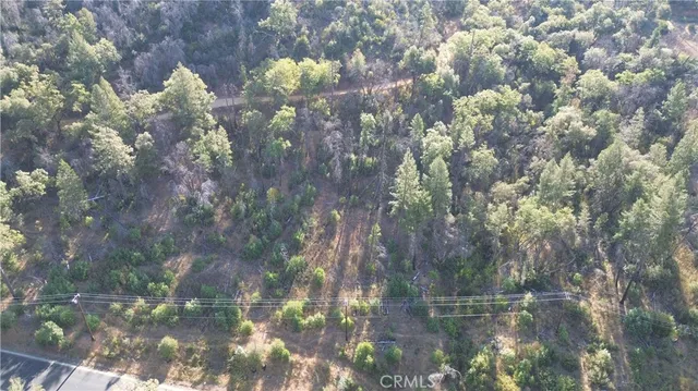 a view of a lake with a yard