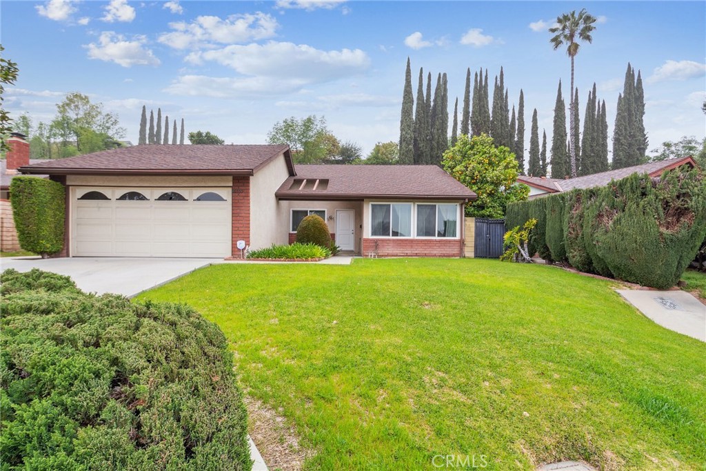 20333 East Vejar Road Walnut, CA 91789 - Photo 1 of 1 a front view of a house with garden