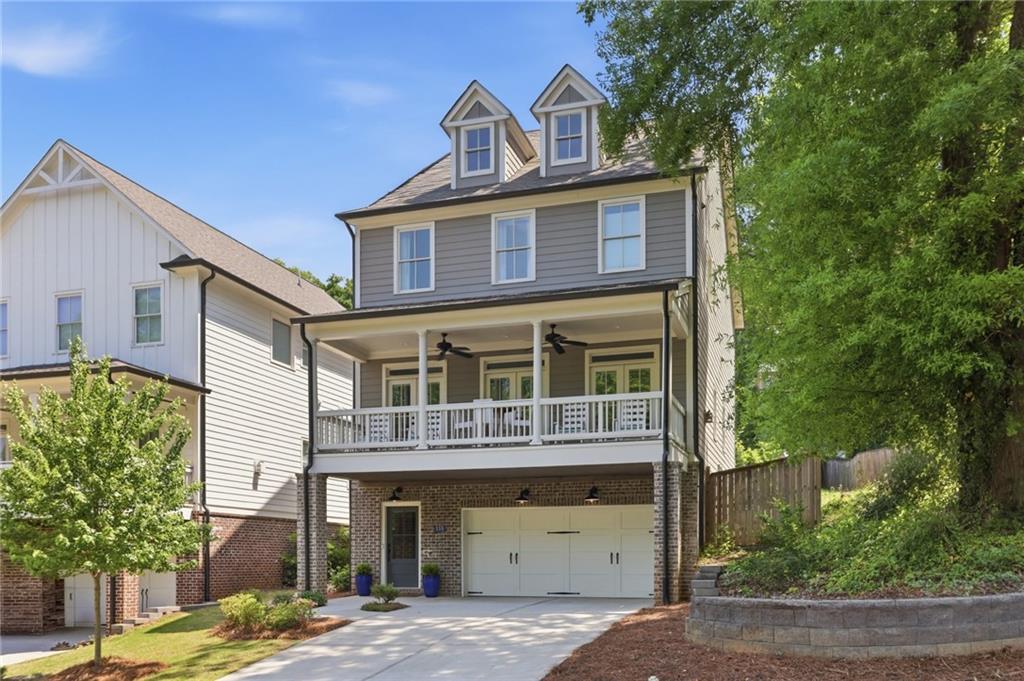138 Rigby Street Northeast Marietta, GA 30060 - Photo 1 of 39 a front view of a house