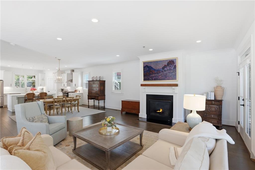 138 Rigby Street Northeast Marietta, GA 30060 - Photo 15 of 39 a living room with furniture a fireplace and a table