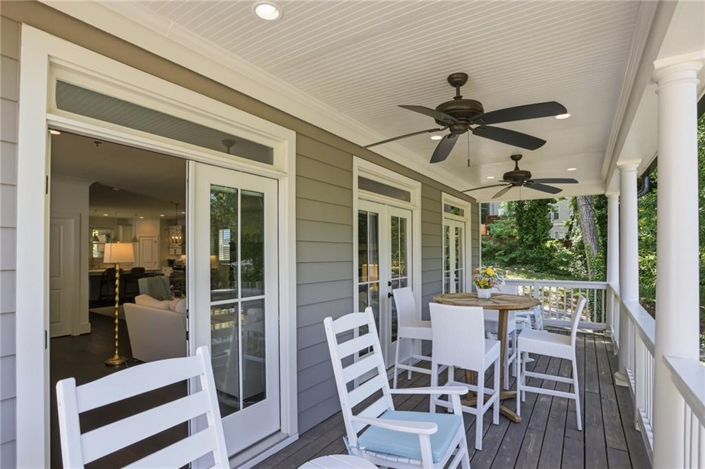 138 Rigby Street Northeast Marietta, GA 30060 - Photo 18 of 39 a view of a dining room and hall with wooden floor
