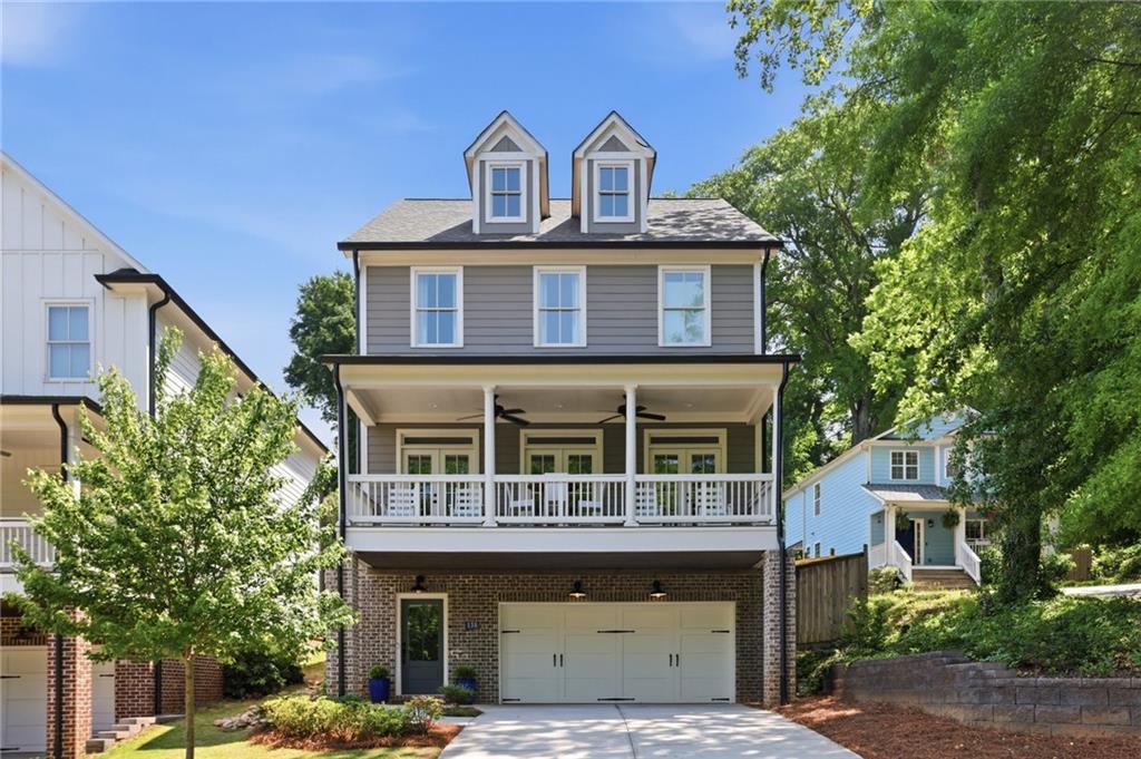 138 Rigby Street Northeast Marietta, GA 30060 - Photo 2 of 39 a front view of a house with garden