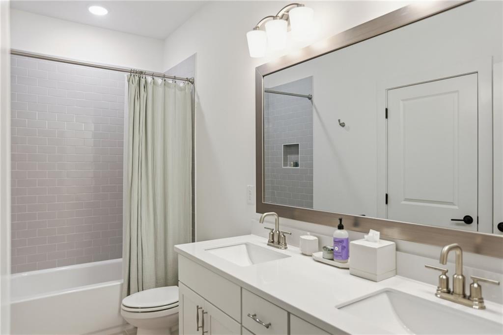 138 Rigby Street Northeast Marietta, GA 30060 - Photo 29 of 39 a bathroom with a sink toilet and shower