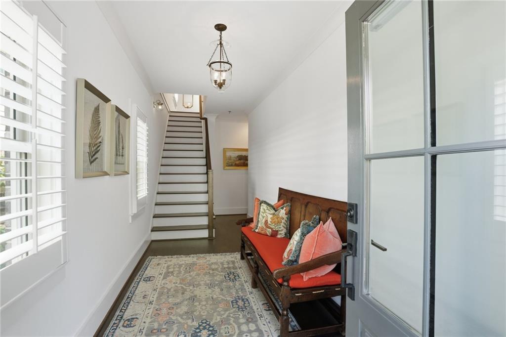 138 Rigby Street Northeast Marietta, GA 30060 - Photo 3 of 39 a view of a hallway with stairs and a couch