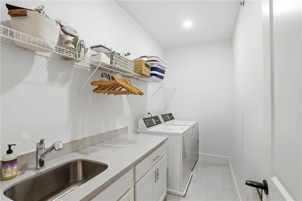 138 Rigby Street Northeast Marietta, GA 30060 - Photo 31 of 39 a bathroom with a sink and mirror