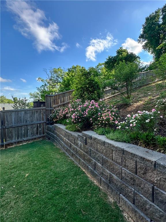138 Rigby Street Northeast Marietta, GA 30060 - Photo 37 of 39 a view of a yard with wooden fence