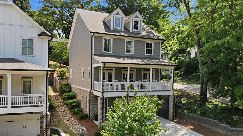 138 Rigby Street Northeast Marietta, GA 30060 - Photo 39 of 39 front view of a house with a yard