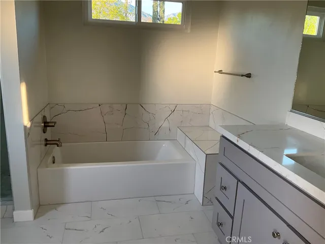 a bathroom with a bathtub