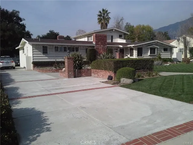 front view of a house with a patio