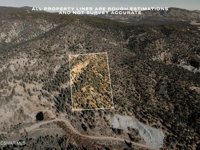 a view of mountain with sunset