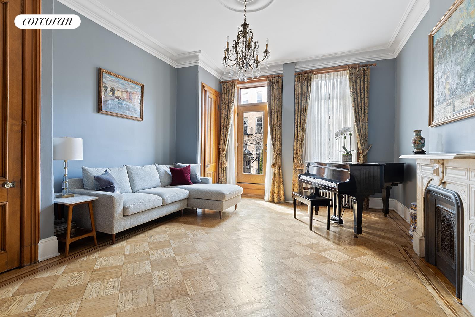 340 4th Street Brooklyn, NY 11215 - Photo 1 of 1 a living room with furniture a large window and a table