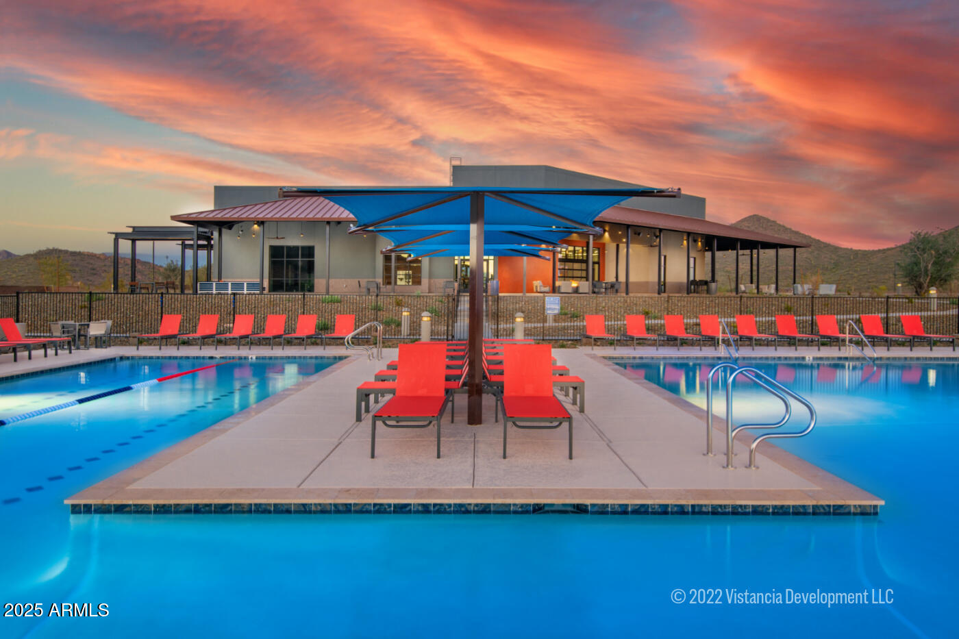 13423 West Eagle Feather Road Peoria, AZ 85383 - Photo 16 of 30 a view of lawn chairs and table under an umbrella
