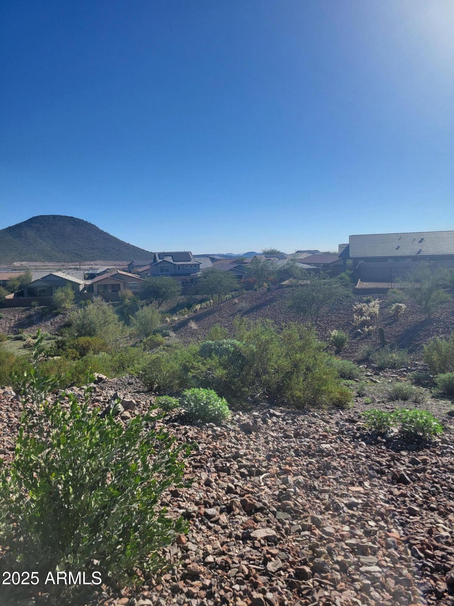 13423 West Eagle Feather Road Peoria, AZ 85383 - Photo 6 of 30 a view of a lush green field