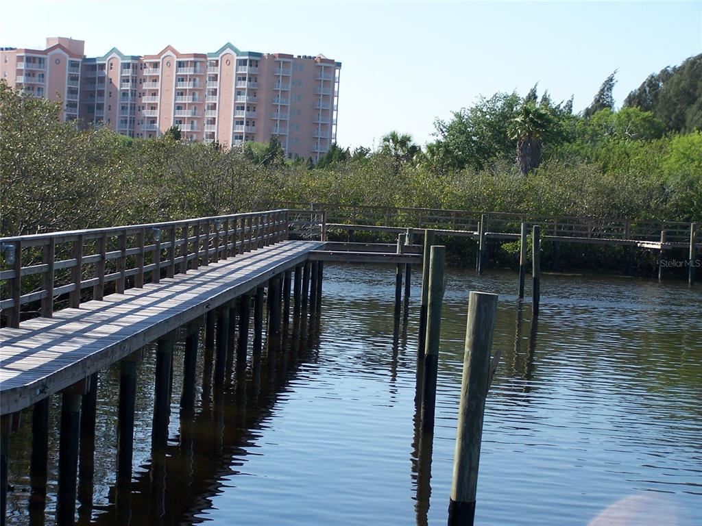 0 Jenny Way New Port Richey, FL 34652 - Photo 3 of 8 a balcony with wooden floor and lake view
