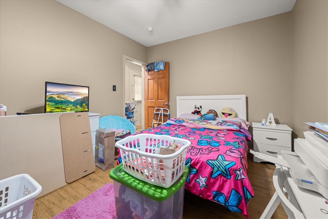 1102 West End Avenue Anderson, SC 29625 - Photo 19 of 28 This spacious bedroom offers ample room for personalization and comfort.