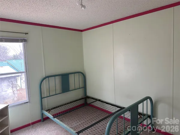a bathroom with a tub and shower