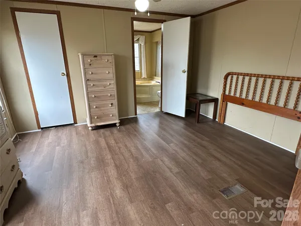 a bath tub sitting in a bathroom next to a window
