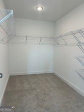 517 Principal Meridian Drive, Unit 22 Dallas, GA 30132 - Photo 14 of 17 a view of a room with racks on the wall