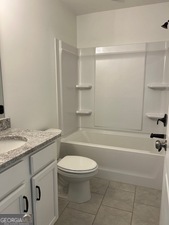 517 Principal Meridian Drive, Unit 22 Dallas, GA 30132 - Photo 7 of 17 a bathroom with a granite countertop bathtub shower sink vanity and toilet