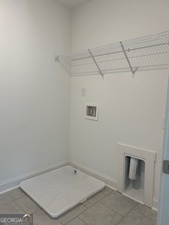 517 Principal Meridian Drive, Unit 22 Dallas, GA 30132 - Photo 9 of 17 a view of a room with racks on the wall