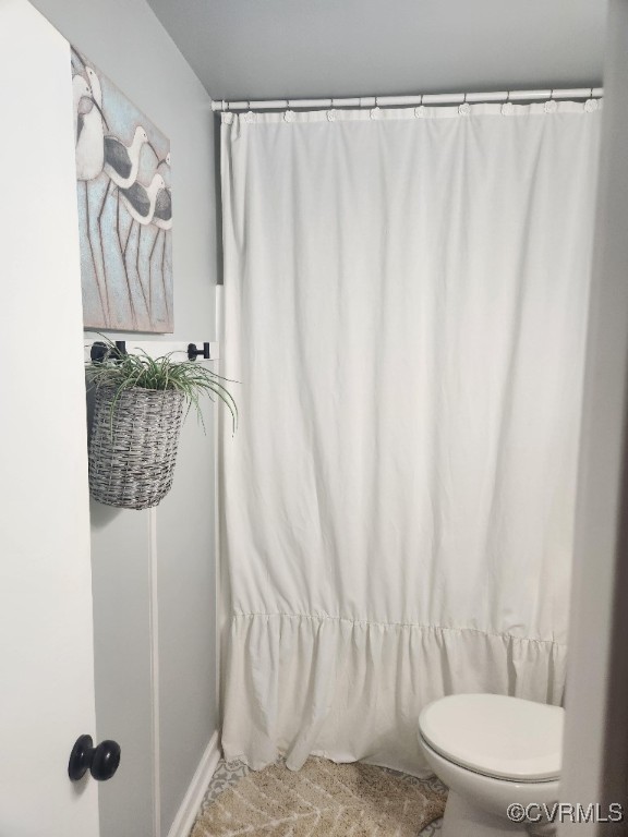 7000 Deer Run Lane Midlothian, VA 23112 - Photo 13 of 27 a bathroom with a shower curtain and a sink