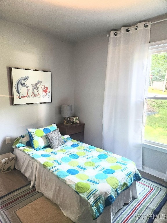 7000 Deer Run Lane Midlothian, VA 23112 - Photo 15 of 27 a bedroom with a bed and a window