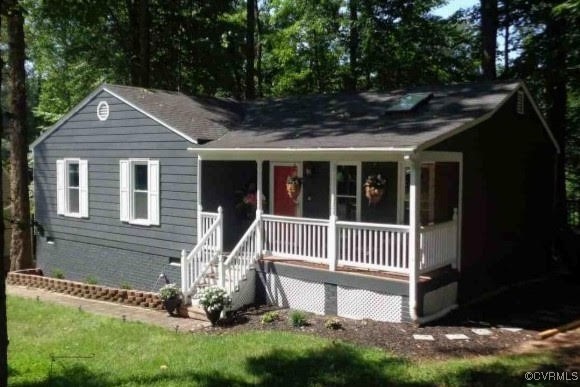 7000 Deer Run Lane Midlothian, VA 23112 - Photo 2 of 27 a front view of a house with a yard