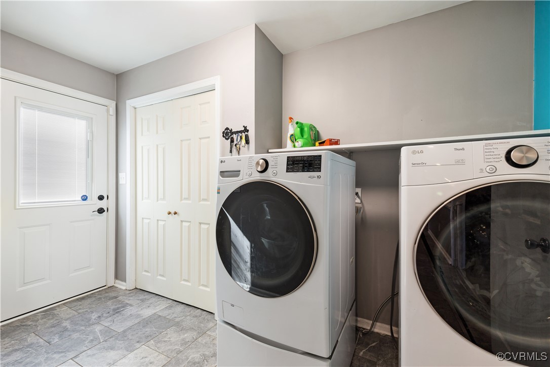 204 Pine Street Jarratt, VA 23867 - Photo 11 of 25 Laundry room with baseboards, laundry area, and in