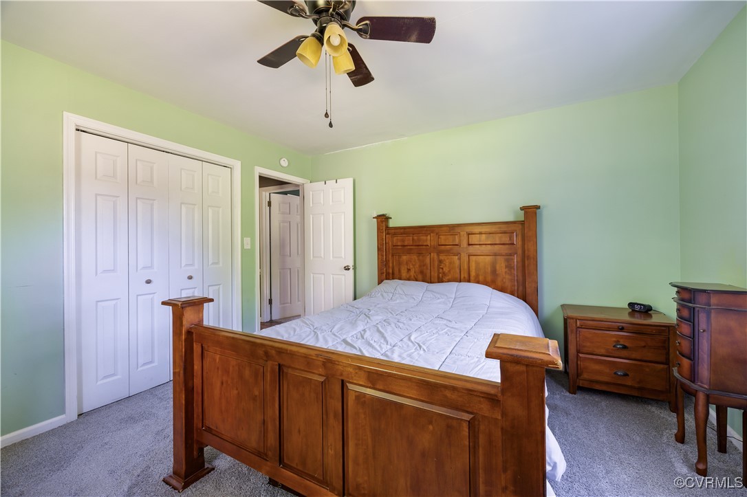 204 Pine Street Jarratt, VA 23867 - Photo 20 of 25 Bedroom featuring a closet, carpet flooring, baseb
