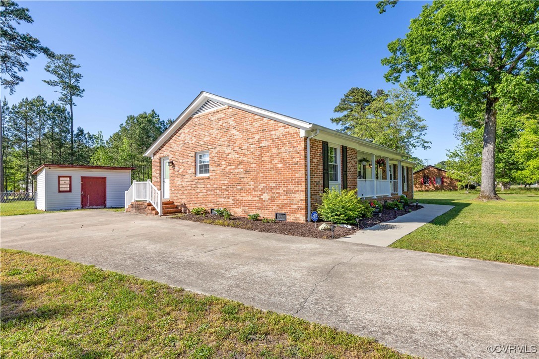 204 Pine Street Jarratt, VA 23867 - Photo 4 of 25 View of home's exterior with brick siding, crawl s