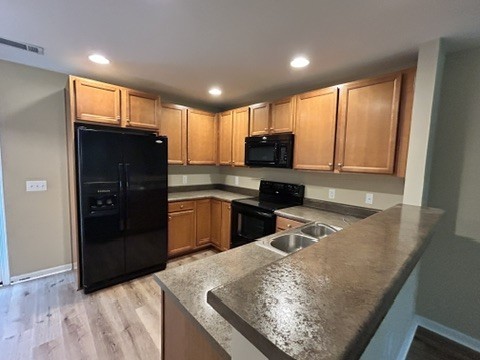312 Mapleton Alley Hermitage, TN 37076 - Photo 19 of 49 a kitchen with stainless steel appliances granite countertop a refrigerator and a sink