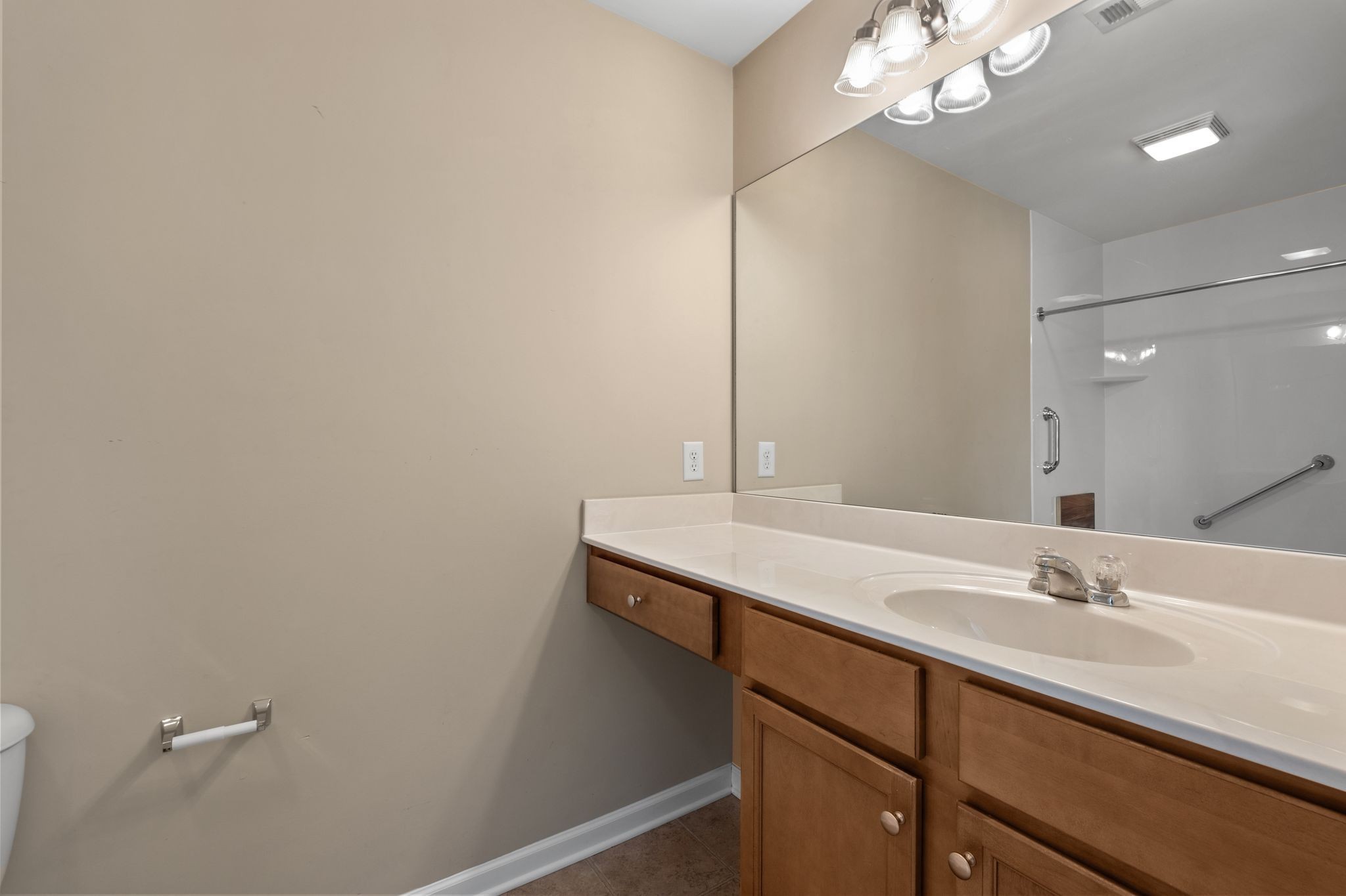 312 Mapleton Alley Hermitage, TN 37076 - Photo 26 of 49 a bathroom with a sink and a mirror