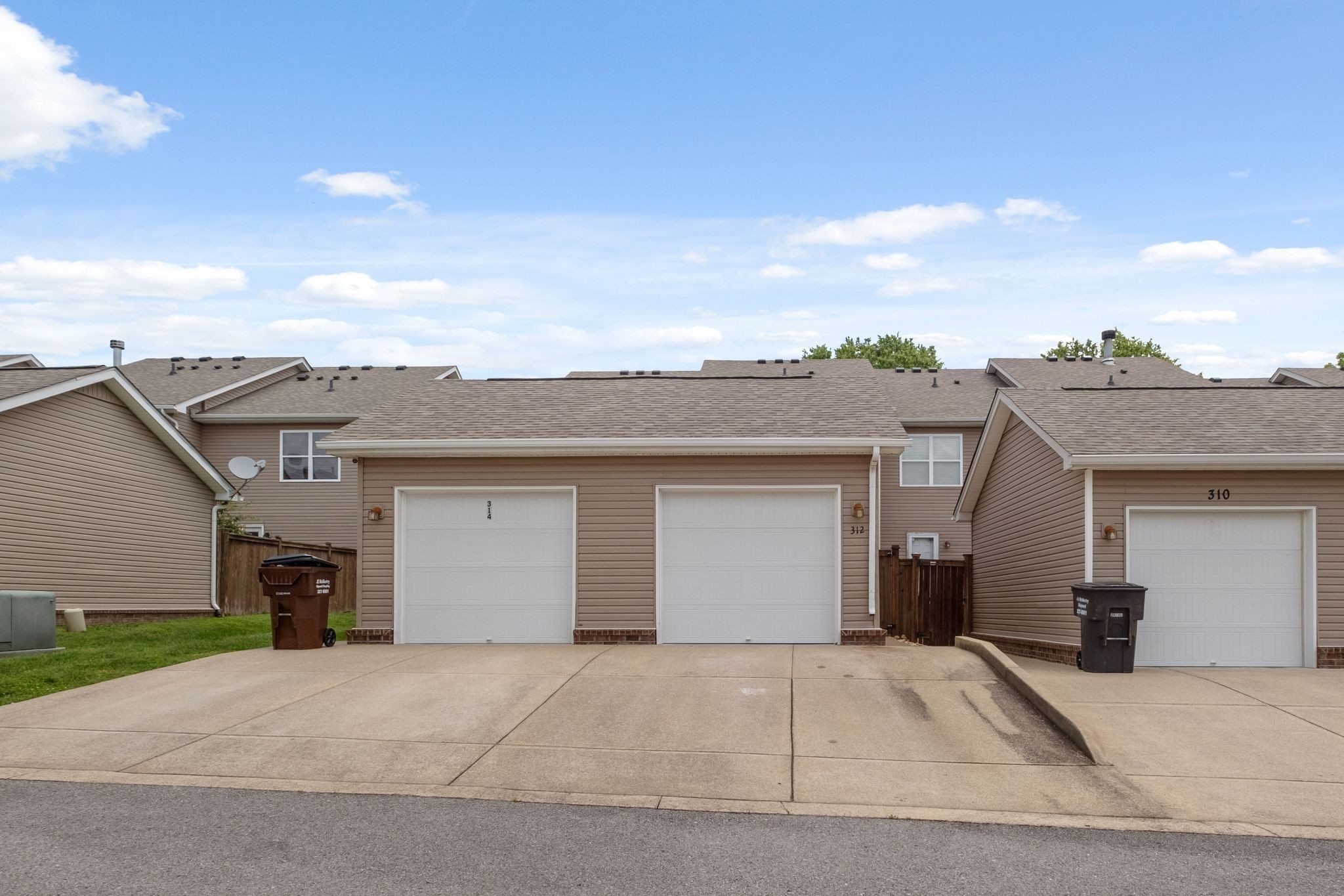 312 Mapleton Alley Hermitage, TN 37076 - Photo 34 of 49 front view of a house with a yard and garage