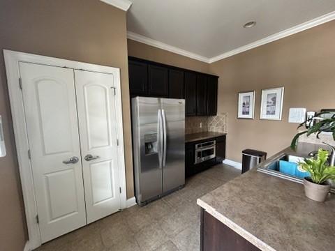 312 Mapleton Alley Hermitage, TN 37076 - Photo 45 of 49 a kitchen with stainless steel appliances granite countertop a refrigerator and a sink