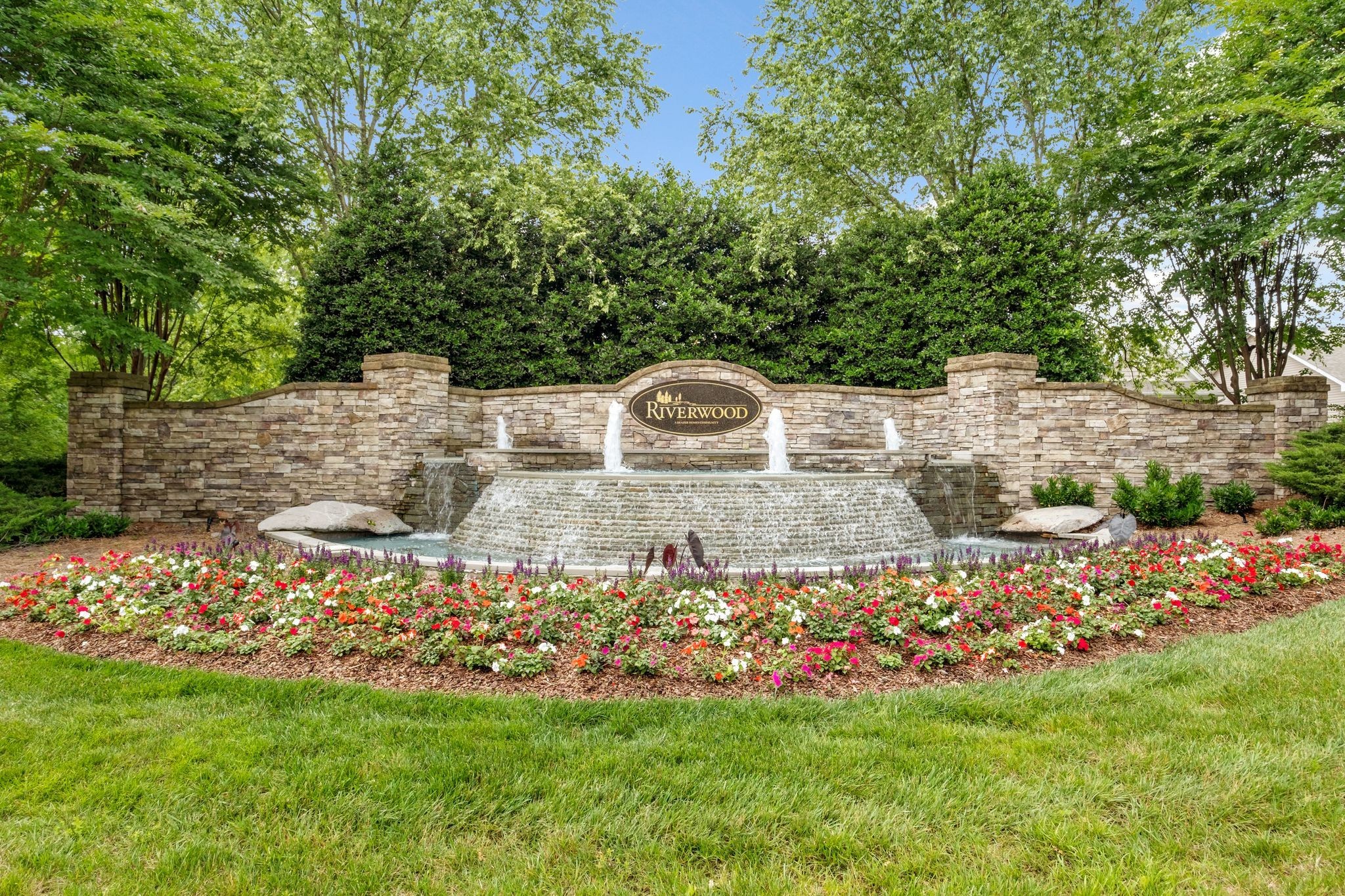 312 Mapleton Alley Hermitage, TN 37076 - Photo 7 of 49 a view of a garden with a fountain