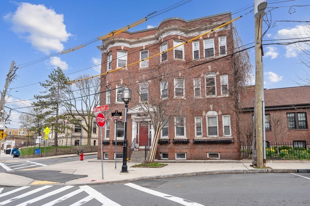 a view of a building and a street