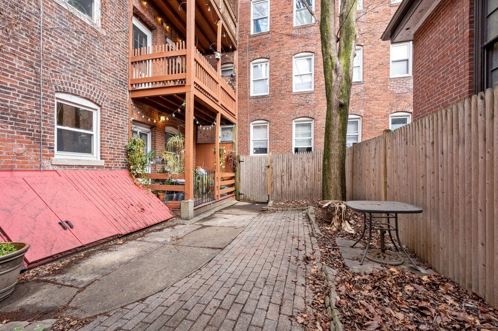 221 Shurtleff Street, Unit 1 Chelsea, MA 02150 - Photo 15 of 16 a view of a backyard with sitting area