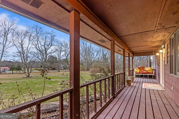 a kitchen with stainless steel appliances a refrigerator and a stove top oven