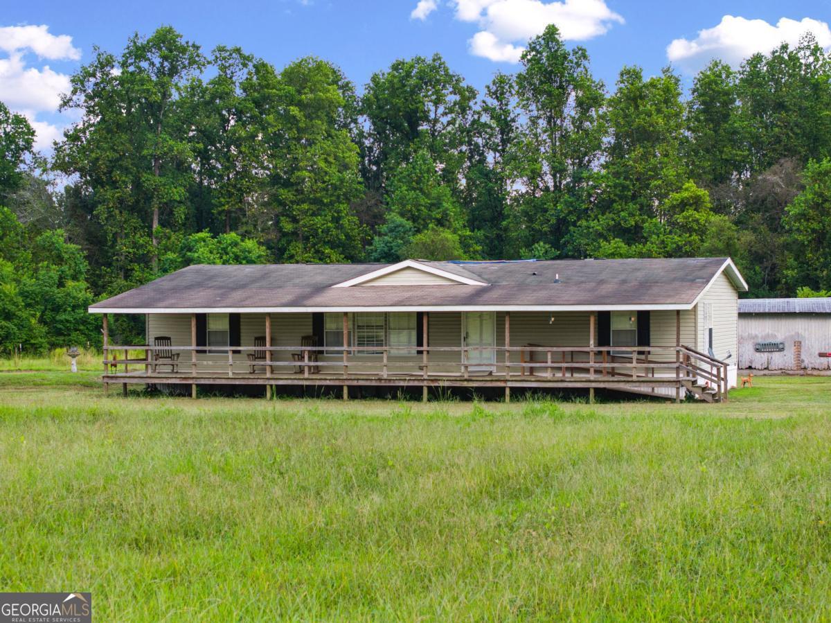 a view of a house with a garden