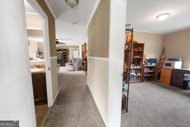 a view of a living room with furniture