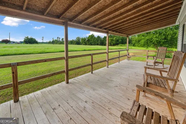 a view of a house with a big yard