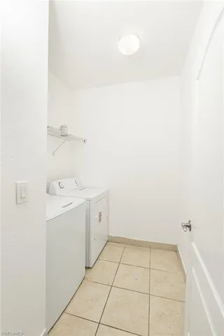 a view of utility room with a sink
