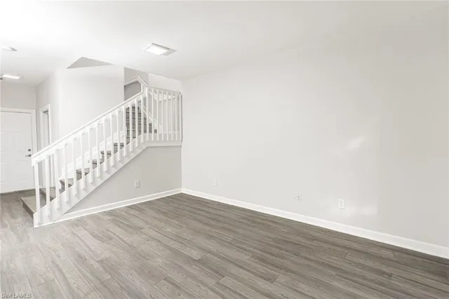 a view of entryway with wooden floor