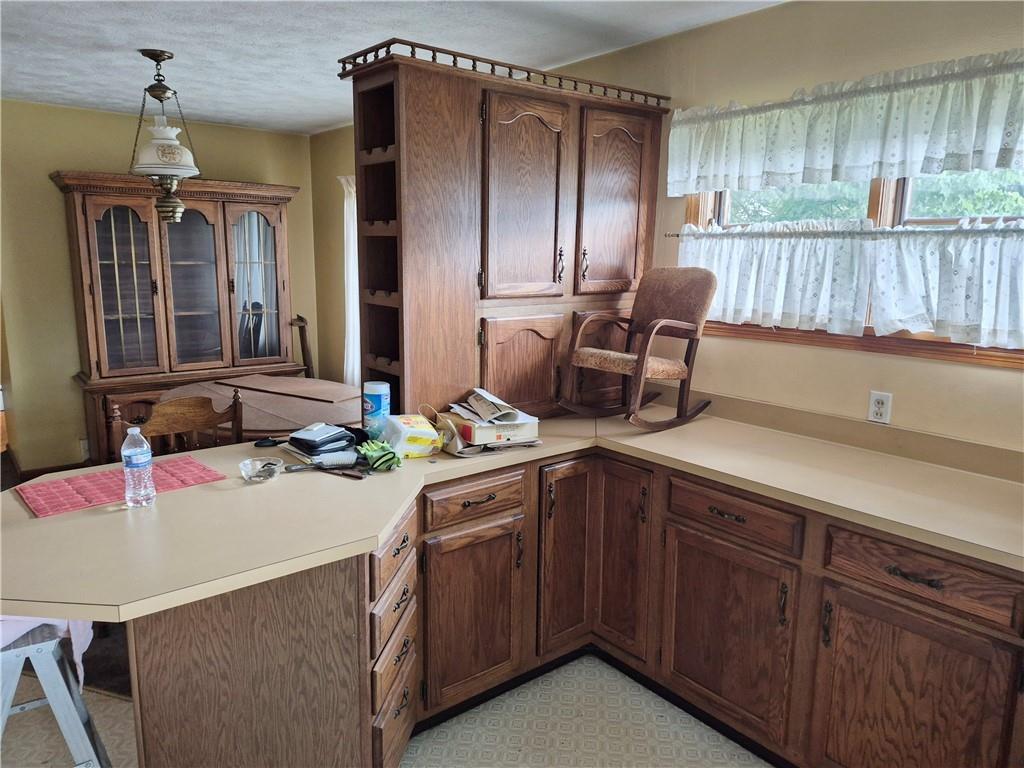 380 Shady Avenue Sharon, PA 16146 - Photo 17 of 36 Wrap around counter with peninsula over looking dining room