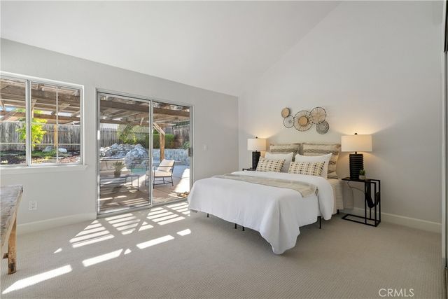 a kitchen with stainless steel appliances granite countertop a stove sink and microwave