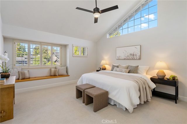 a bathroom with a sink a mirror and a shower