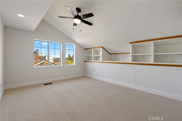 a bathroom with double sink and a mirror