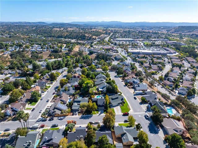 a view of empty room with windows