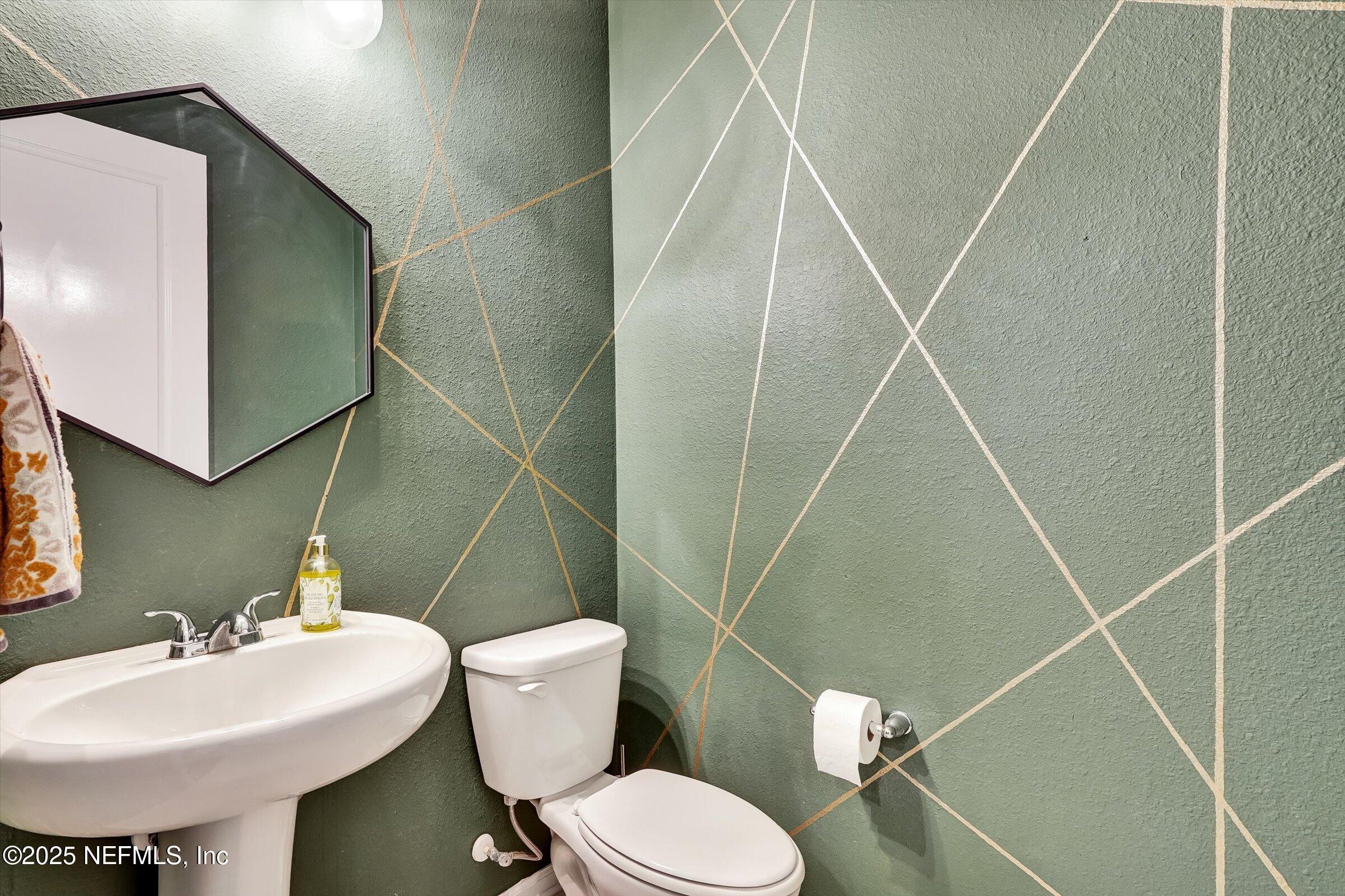 410 Downs Corner Road St. Augustine, FL 32092 - Photo 22 of 45 a bathroom with a sink toilet and shower